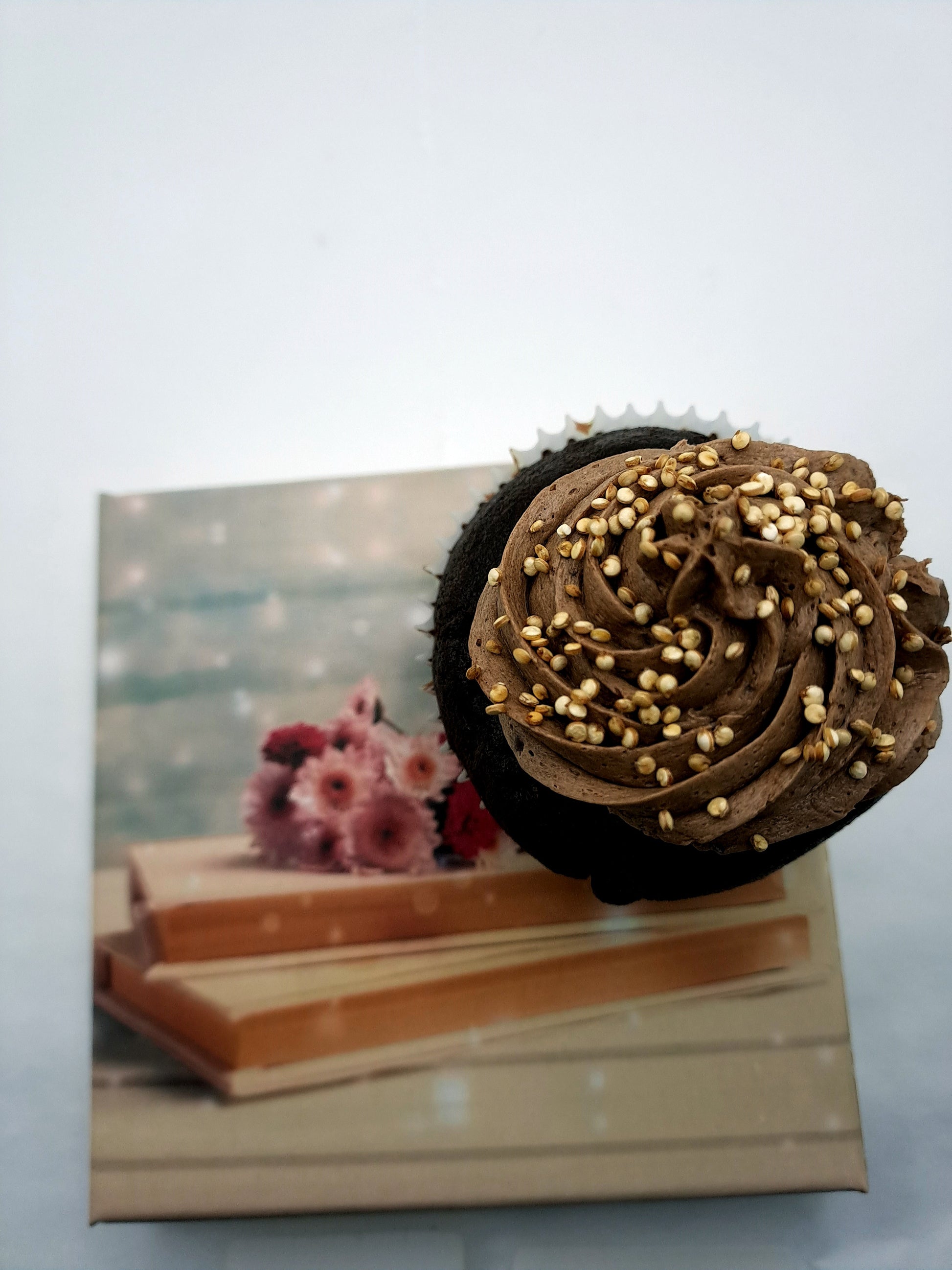 Vegan chocolate muffin with creamy frosting